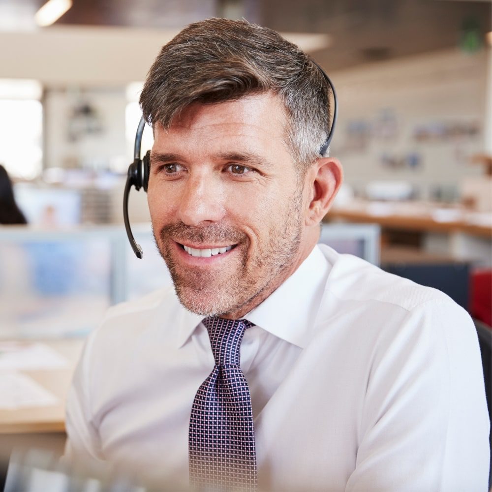 Man talking through a headset