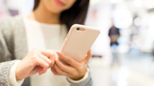 Woman Working on Cellphone